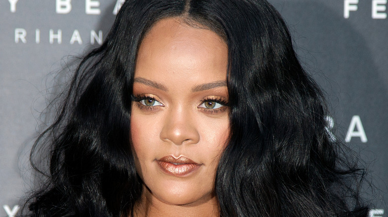 Rihanna posing at an event