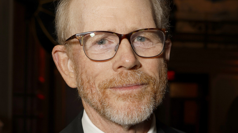 Ron Howard wearing a black suit