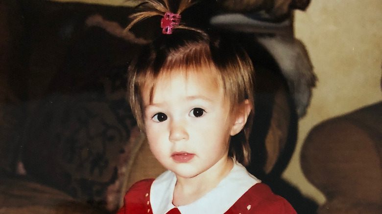 Young Scarlet Stallone with short hair