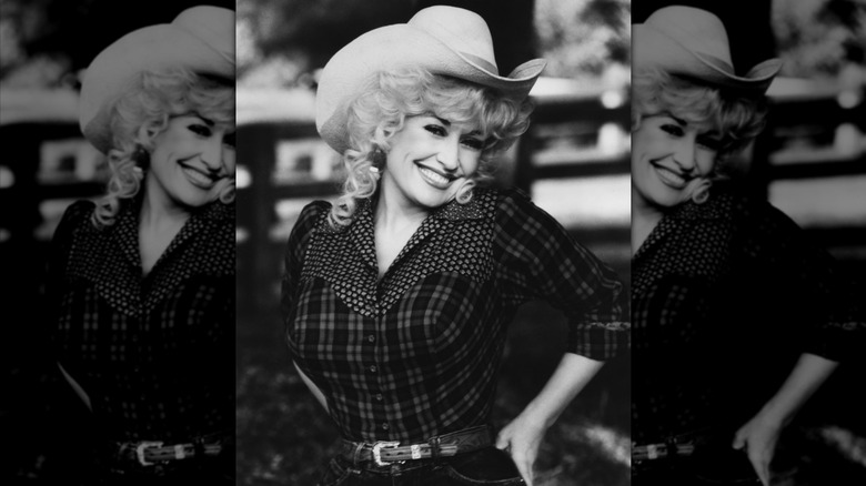 Dolly Parton wearing a cowboy hat in a black and white photo