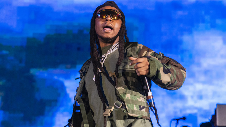 Takeoff rapper performing