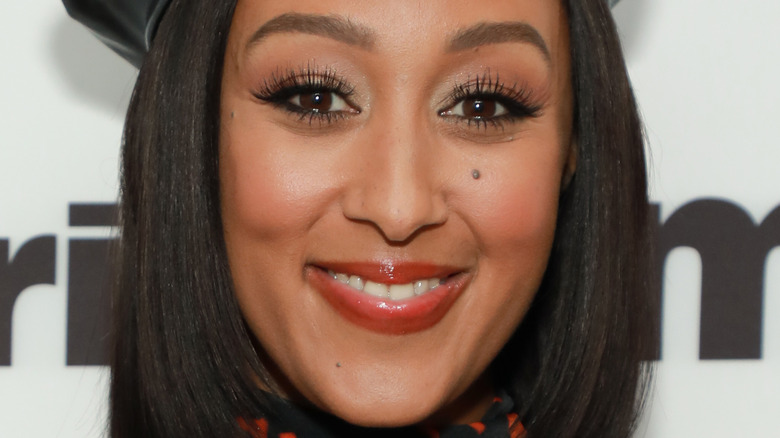 Tamera Mowry smiling