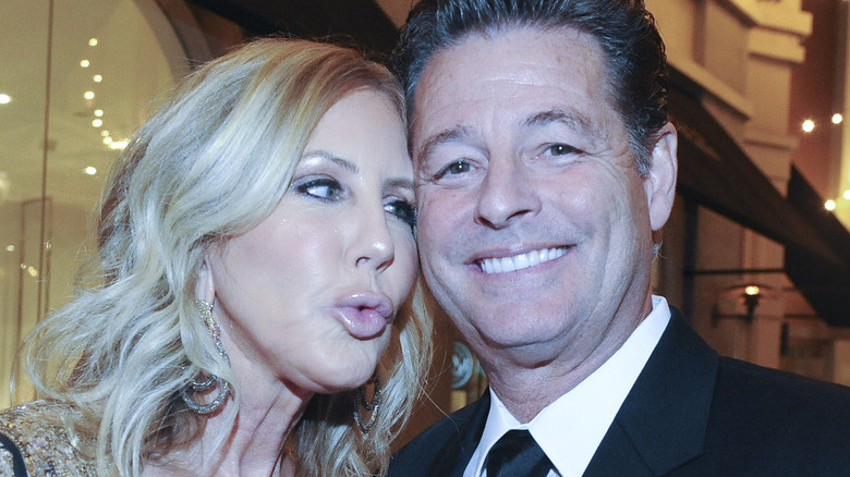 Vicki Gunvalson and Steve Lodge posing at an event