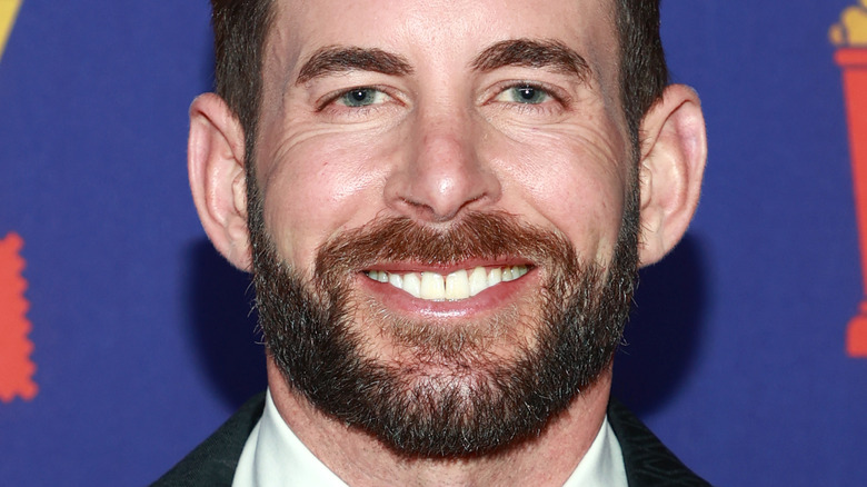 Tarek El Moussa, smiling, facial hair, wearing a suit, 2021 MTV red carpet photo