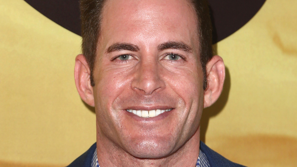 Tarek El Moussa smiling at an event