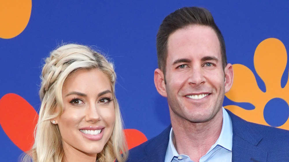 Tarek El Moussa and Heather Rae Young at an event 