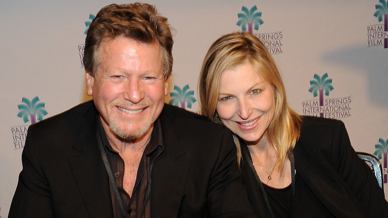 Ryan O'Neal and Tatum O'Neal smiling