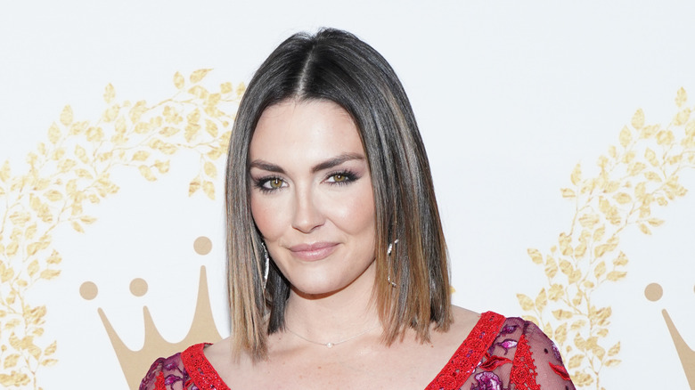 Taylor Cole smiling bobbed hair