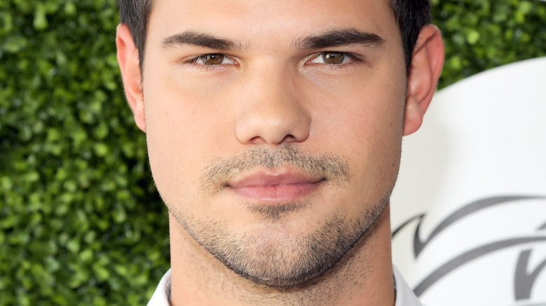 Taylor Lautner posing