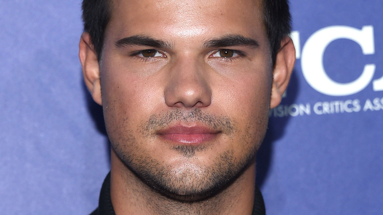 Taylor Lautner posing