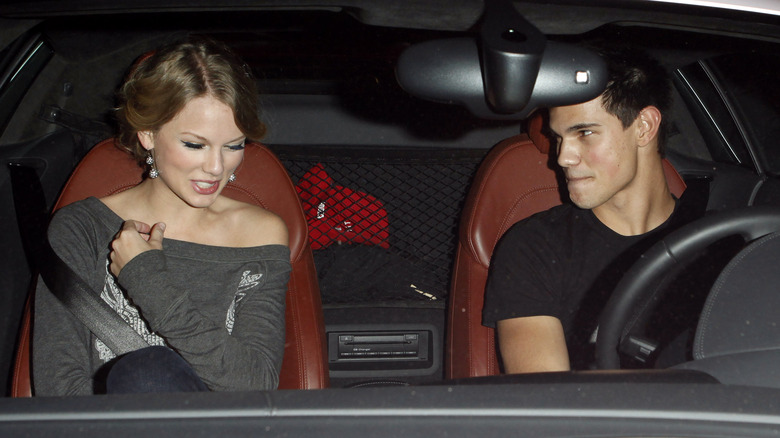 Taylor Swift and Taylor Lautner driving