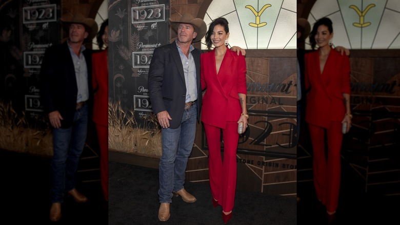 Taylor Sheridan and Nicole Muirbrook posing at the "1923" premiere.