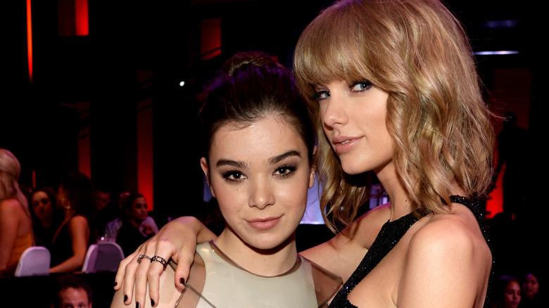 Hailee Steinfeld and Taylor Swift at a party