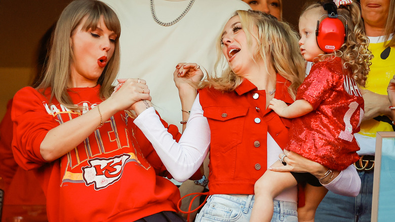 Taylor Swift and Brittany Mahomes dancing