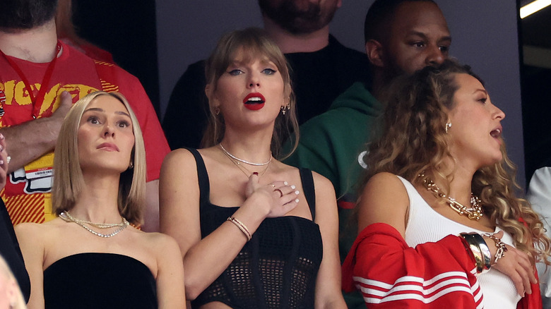 Taylor Swift watching Super Bowl hand on heart