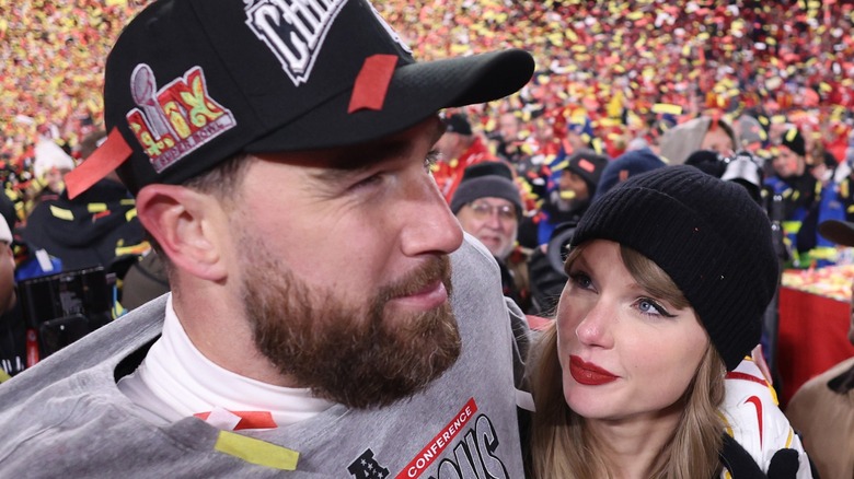 Taylor Swift stares at Travis Kelce as they embrace after the AFC Championship Game in Kansas City, MO (2025)