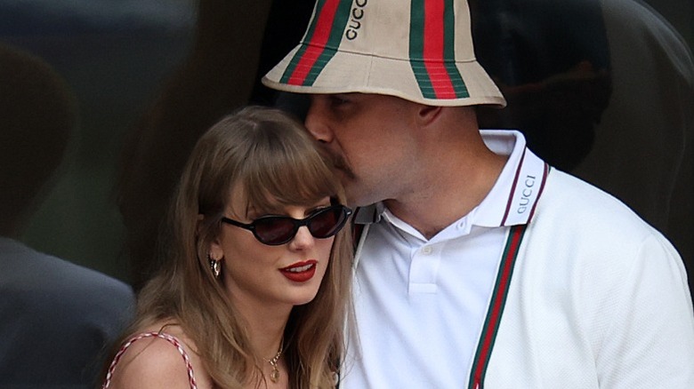 Travis Kelce kisses Taylor Swift on the head during the 2024 U.S. Open in New York City
