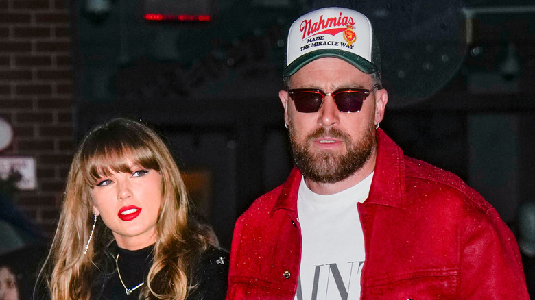 Taylor Swift and Travis Kelce walking in New York