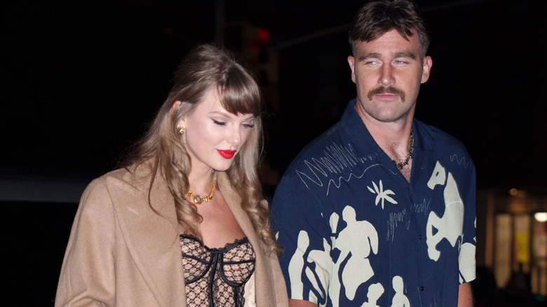 Taylor Swift and Travis Kelce walking together