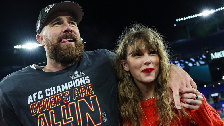 Travis Kelce and Taylor Swift on the football field