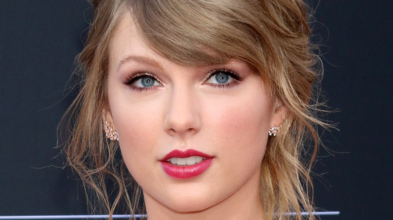 Taylor Swift with sideswept bangs