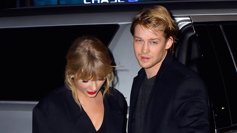 Taylor Swift beside Joe Alwyn