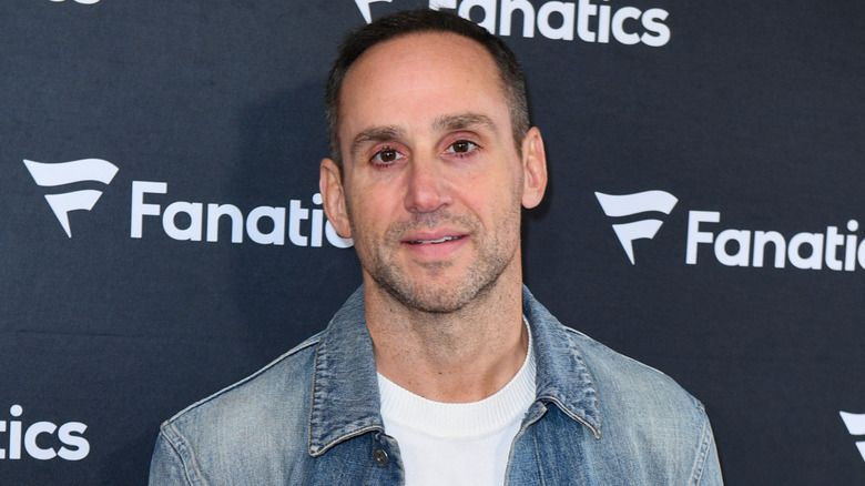 Michael Rubin posing in denim
