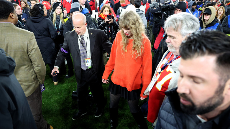 Taylor Swift in a red sweater