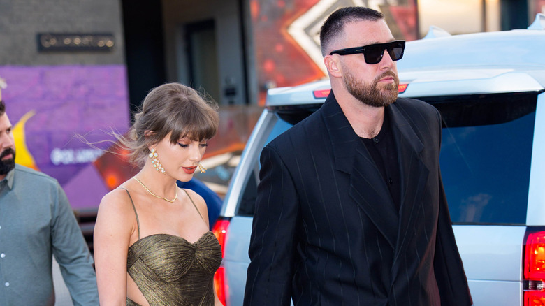 Taylor Swift and Travis Kelce walking