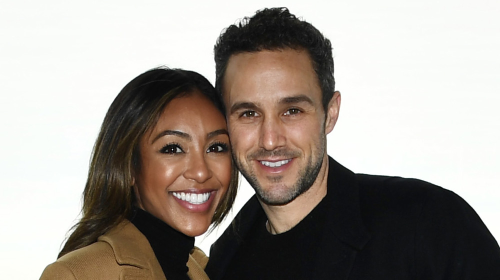 Tayshia Adams and Zac Clark smiling