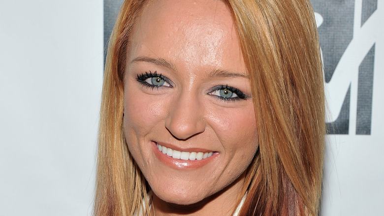 Maci Bookout smiles on the red carpet