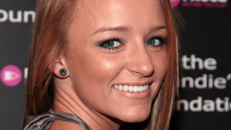 Maci Bookout looking over shoulder