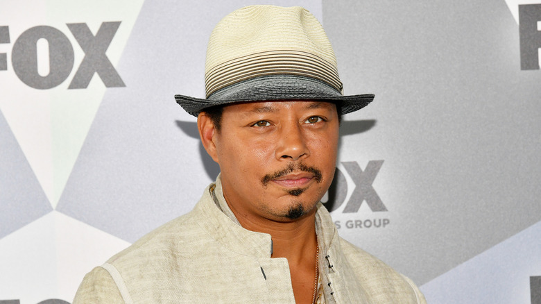 Terrence Howard wearing hat