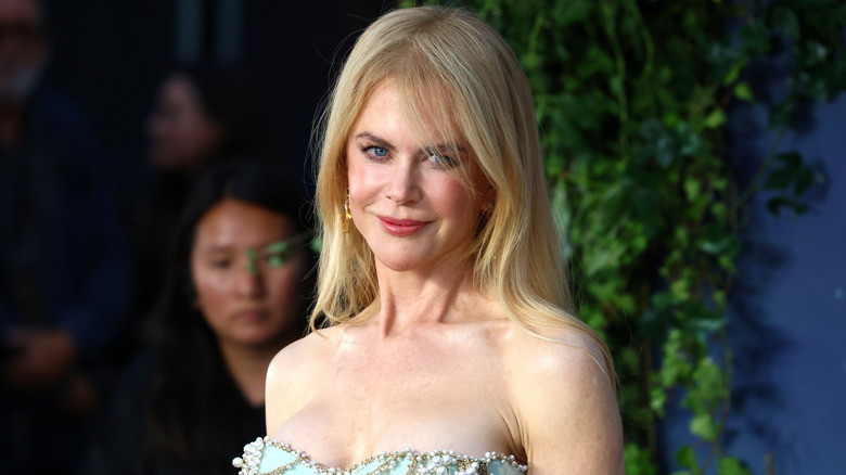 Nicole Kidman smiling at a movie premiere.