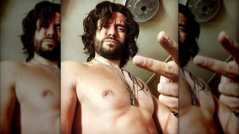 Topher Grace posing for a selfie in his "Get Shorty" hair and makeup.