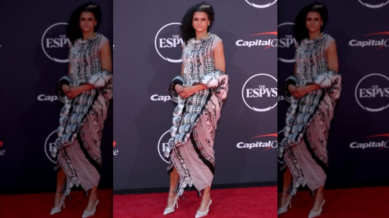 Rae Burrell wearing a black and white patterned dress at the 2025 ESPYs