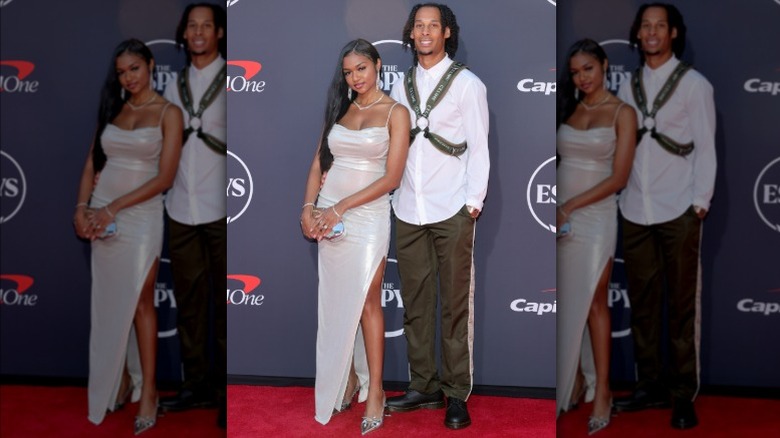 Robbie Chosen Anderson wearing a green harness and white shirt and Sadé Vanessa wearing a white dress at the 2025 ESPYs