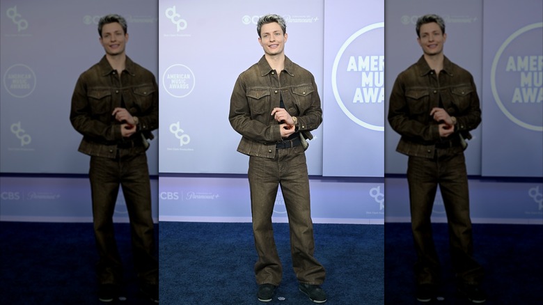 Matt Rife wearing a dark brown denim outfit at the 2026 AMAs.