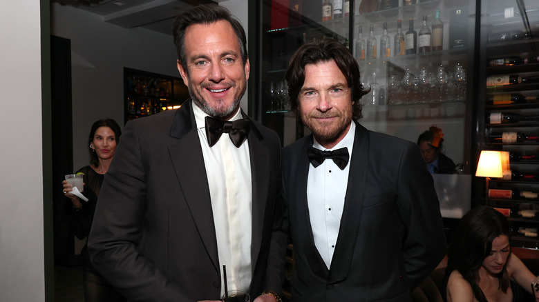 Will Arnett and Jason Bateman smiling and wearing tuxedos
