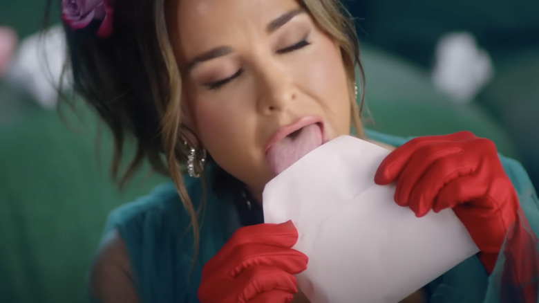 Kyle Richards licking envelope