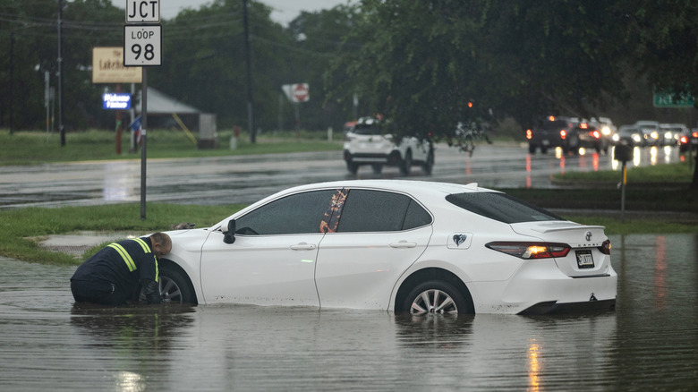A picture of a car submerged in the Texas floods of 2025