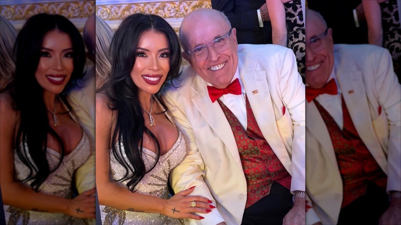 Rudy Giuliani posing with a guest