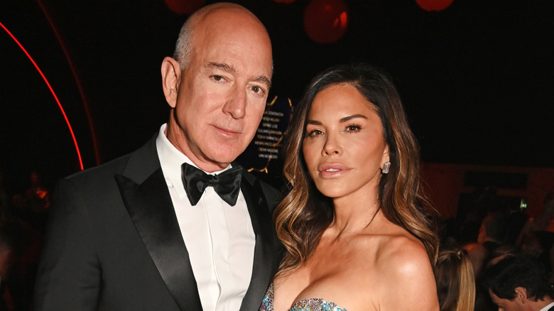Jeff Bezos and Lauren Sánchez pose at the amfAR gala Cannes 2025