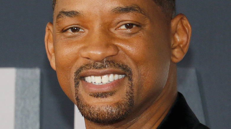 Will Smith smiles