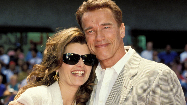 Maria Shriver Arnold Schwarzenegger posing