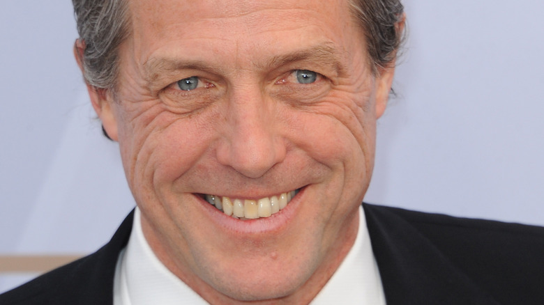 Hugh Grant smiling