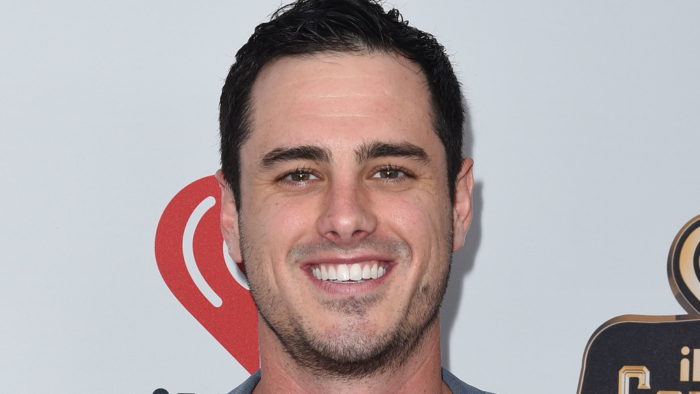 Ben Higgins smiling on the red carpet
