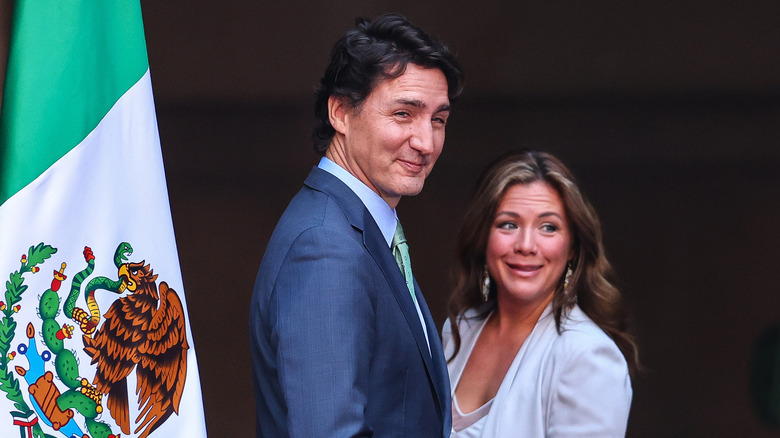 Sophie Grégoire and Justin Trudeau with flag