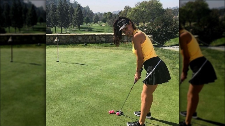 Yassie Safai poses on the golf course