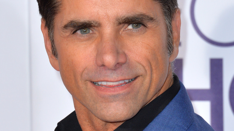 John Stamos smiling